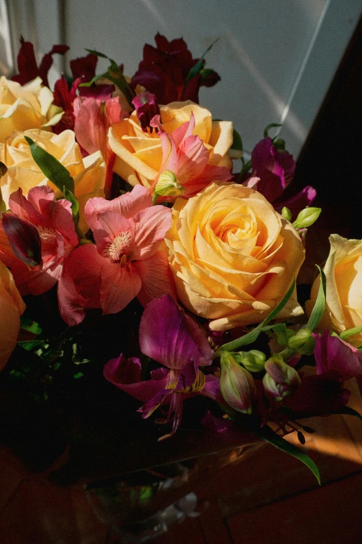 a bunch of flowers that are on a table