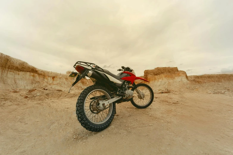 an image of a motorcycle on the beach