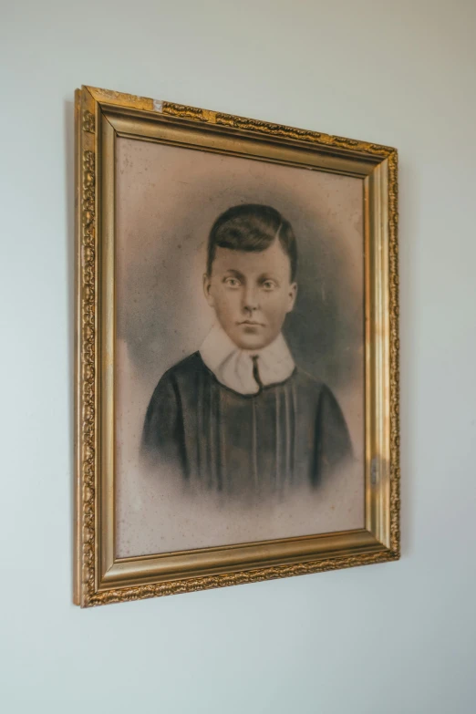 a portrait of a young man in a religious priest outfit