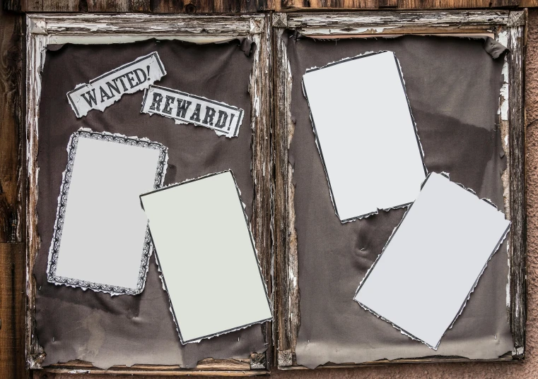 window pane showing white cards, hangers and tape