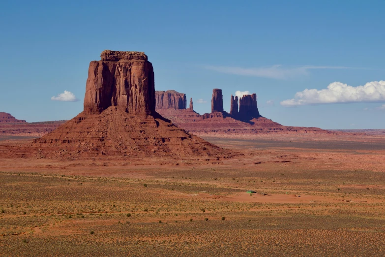 the desert has tall rock formations on it