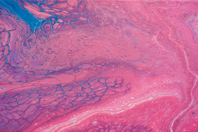 an abstract texture that looks like pink, blue and purple