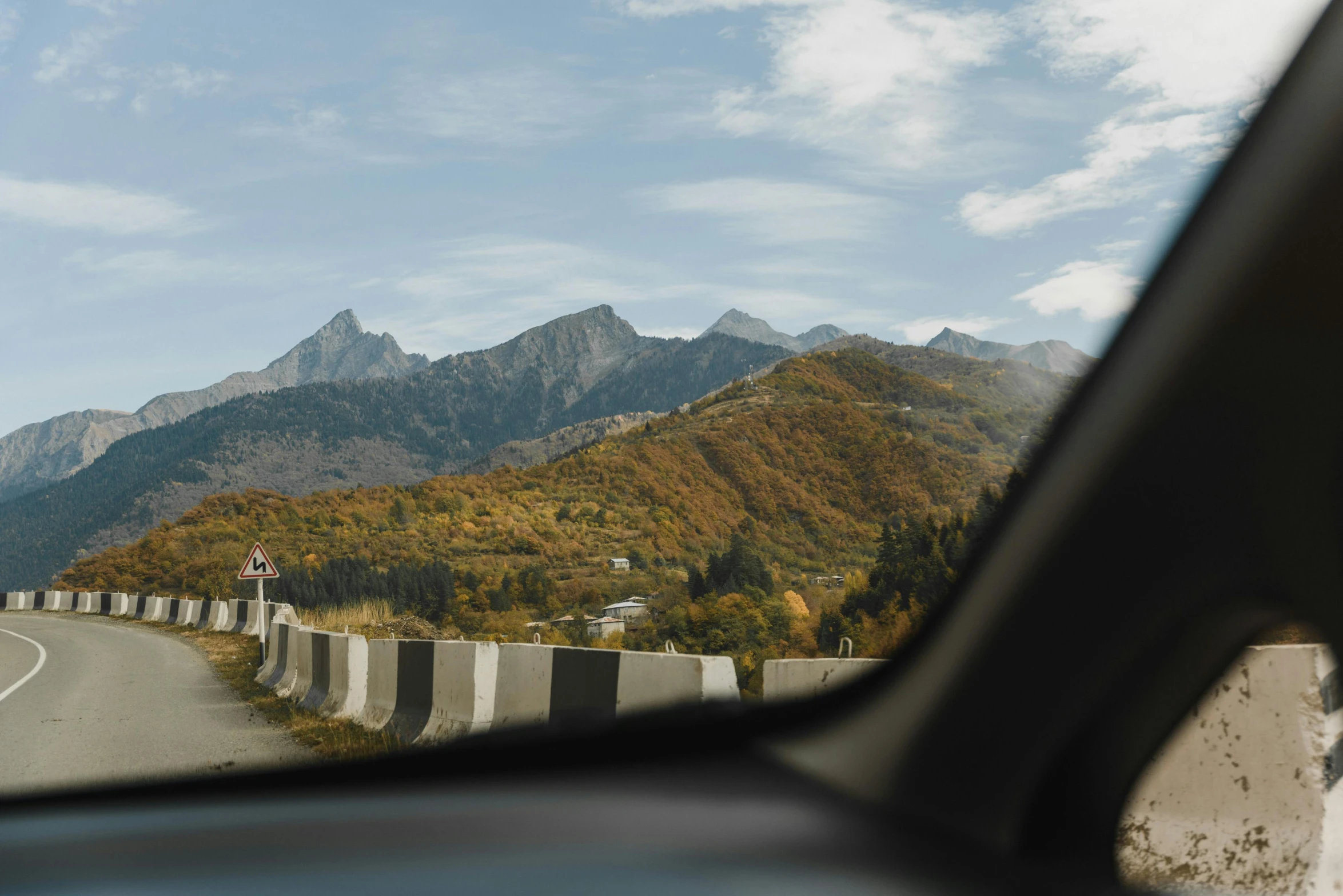 the view of mountains from inside a vehicle