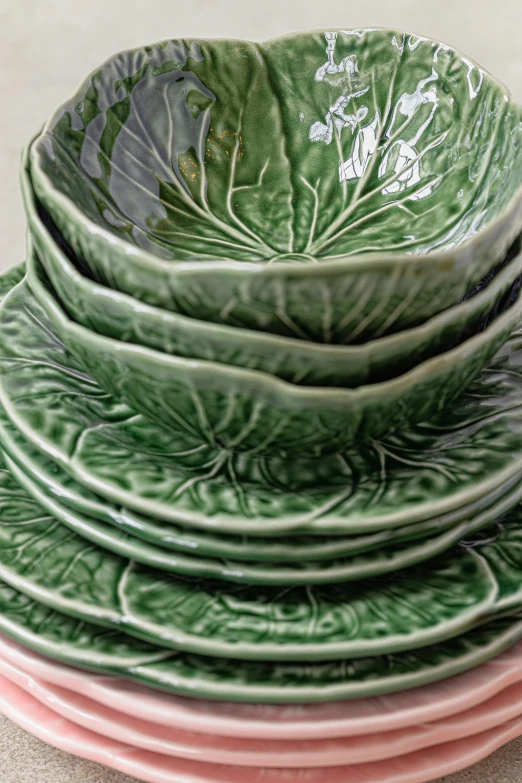 four bowls stacked together in a row