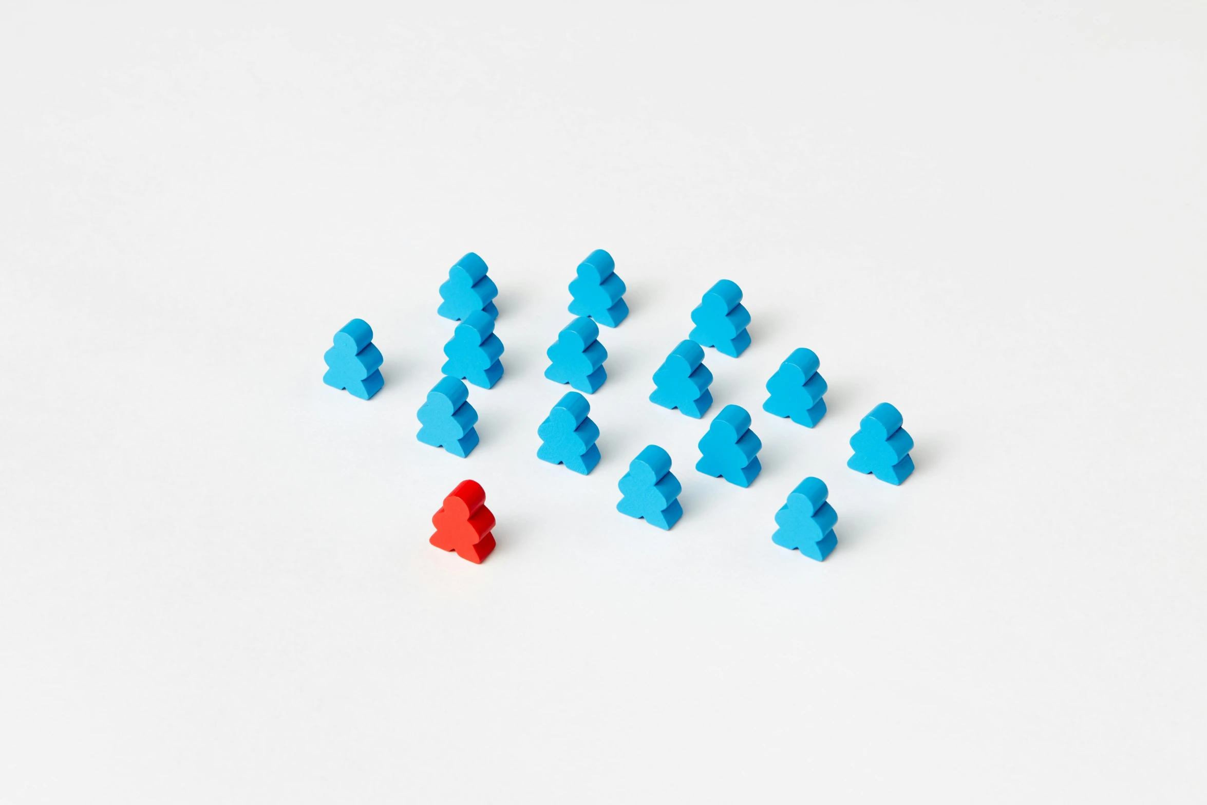 several blue legos are being arranged in a triangle