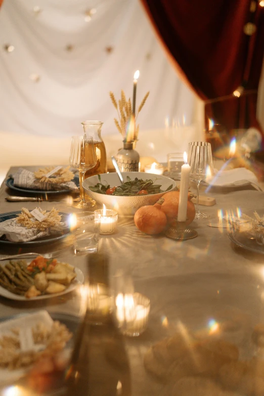 a couple of forks and a table topped with food