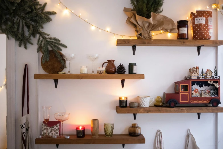 a couple of open shelves with lights