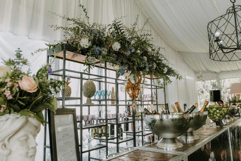 there is a room decorated with plants and flowers