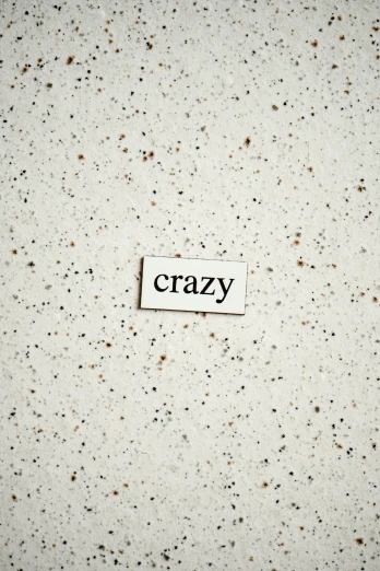 the word crazy written on an ad for a store