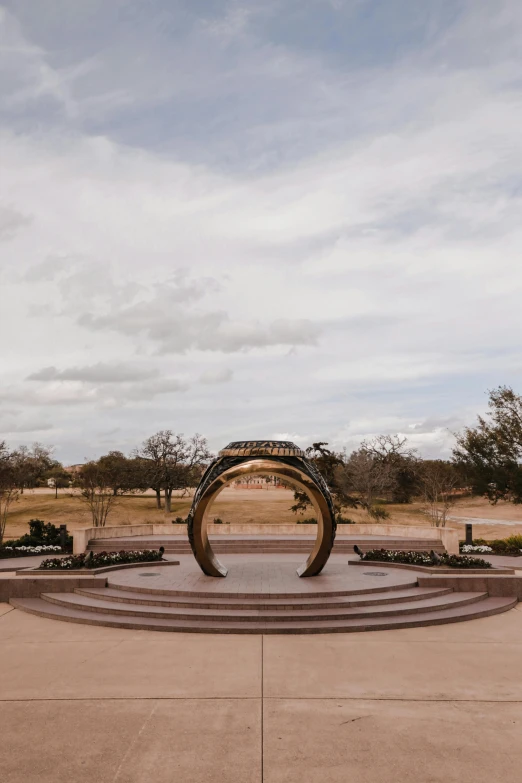 the sundial in front of a large open courtyard