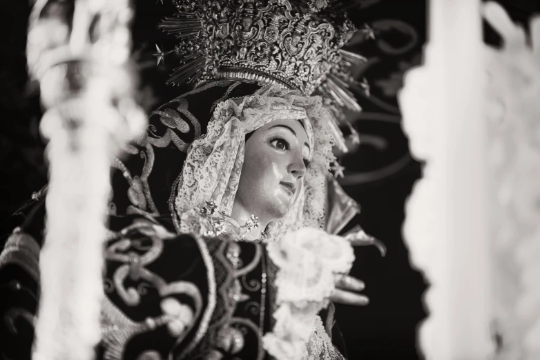 a woman dressed in a costume looks at the mirror