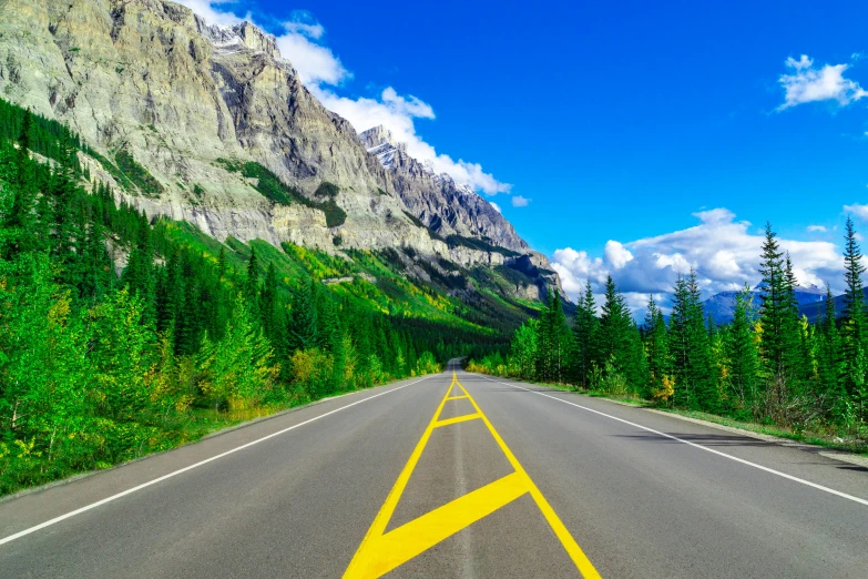 this is an image of the mountains and highway