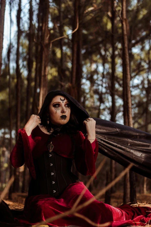 a woman with  all over her face wearing a black corset