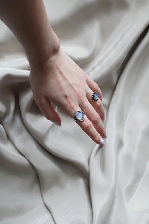 a close up of a hand on a blanket