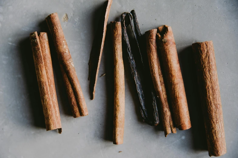 a group of sticks sit on the table