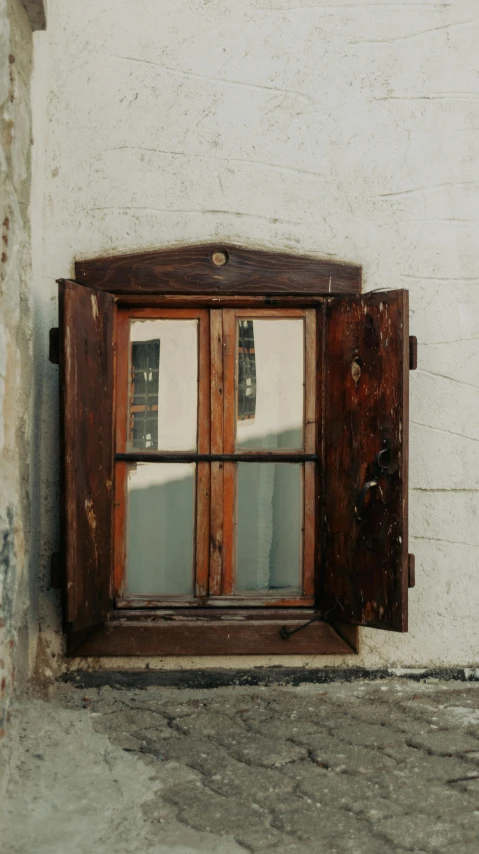 a large window on the outside of a wall