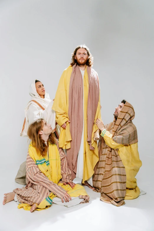 a group of people that are dressed up like jesus