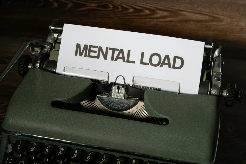 closeup view of a mental load paper on an old typewriter