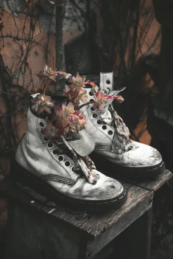 some very pretty shoes with flowers in them