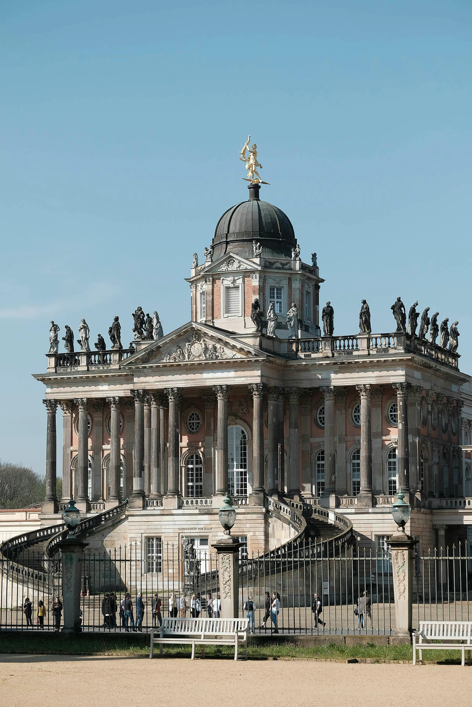 this is a large stone building with statues on it