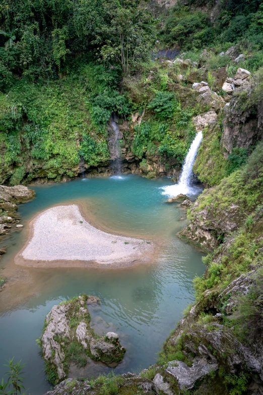 a stream of water running to the top of a mountain