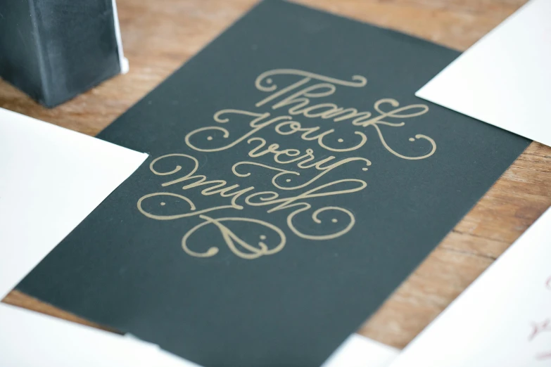 some black and gold foiling on a piece of paper