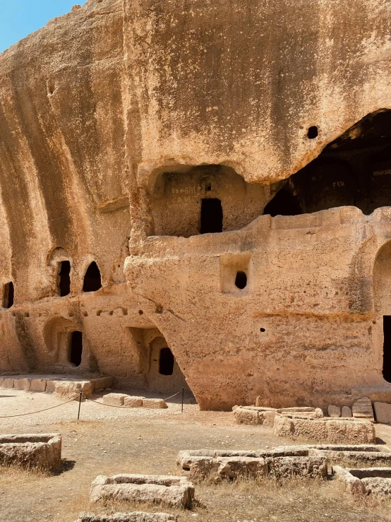 a large rock formation with holes in it