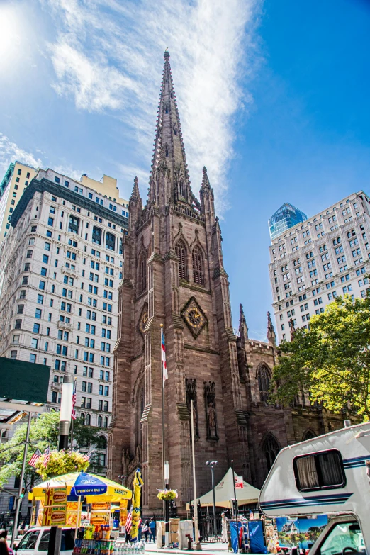 a large cathedral in the middle of a crowded street