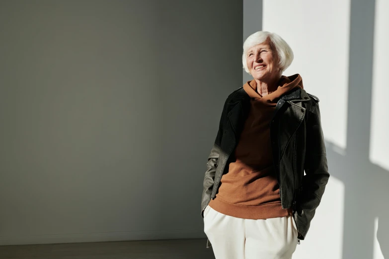 a woman posing for the camera in a room