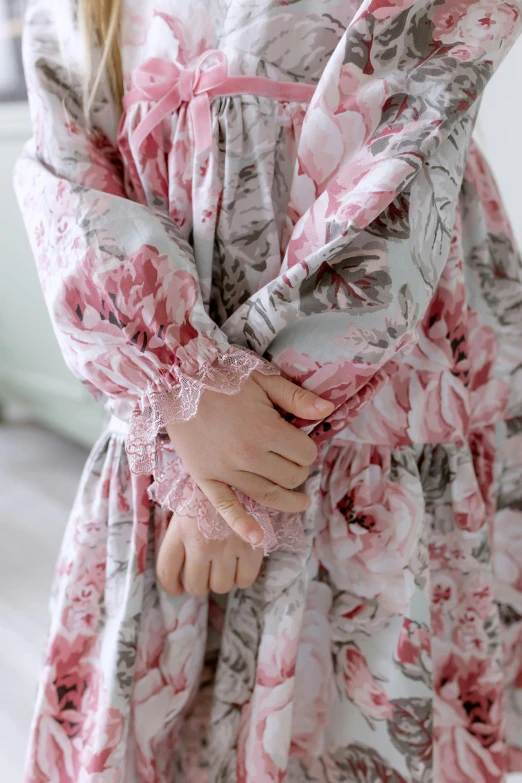 a woman with an lacy arm and her dress covered