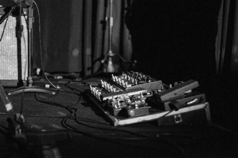 the guitar in a recording studio is surrounded by cables