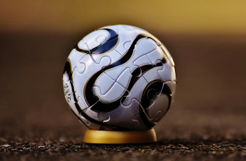 a soccer ball that is sitting on the ground