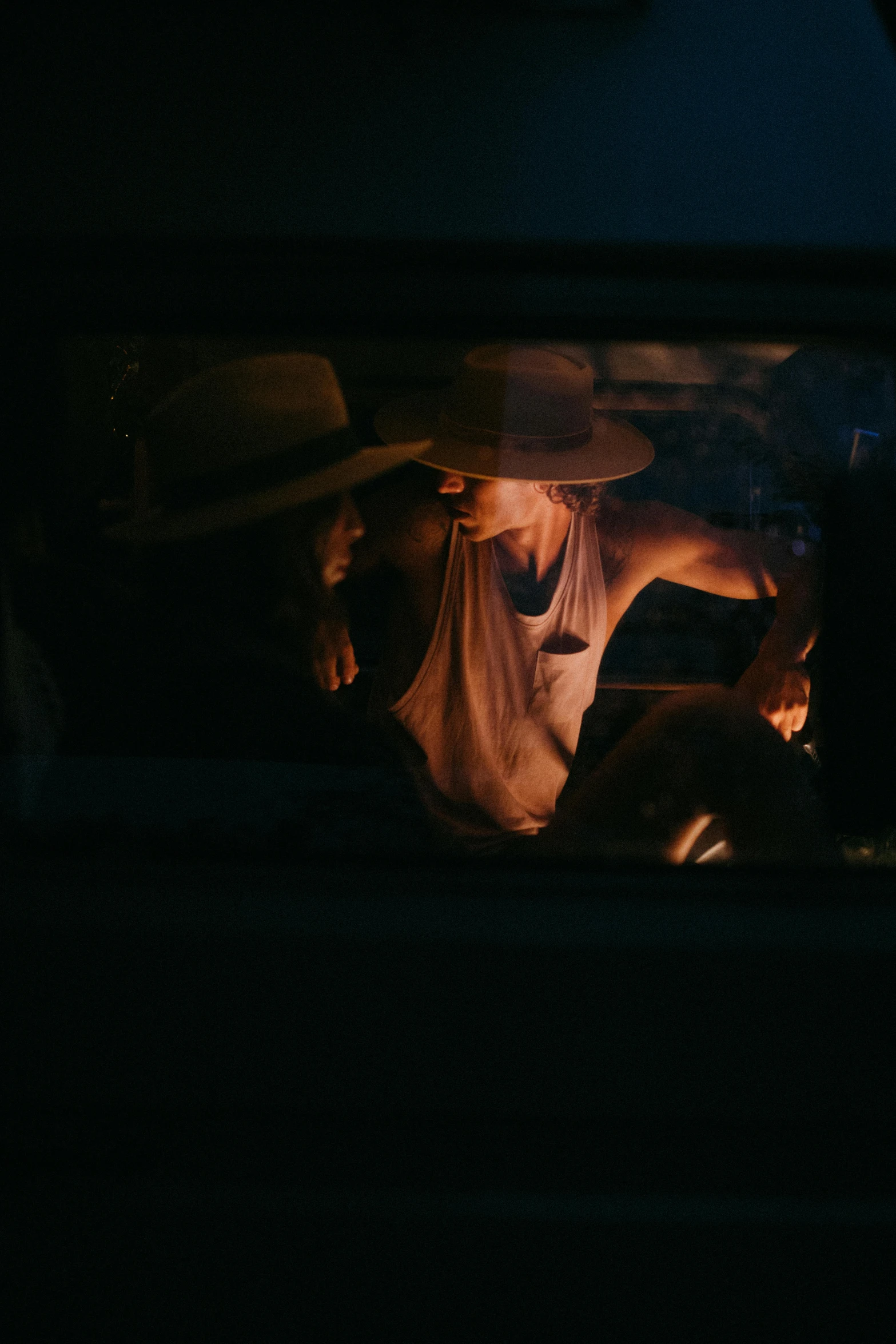 a couple of men that are sitting in a car