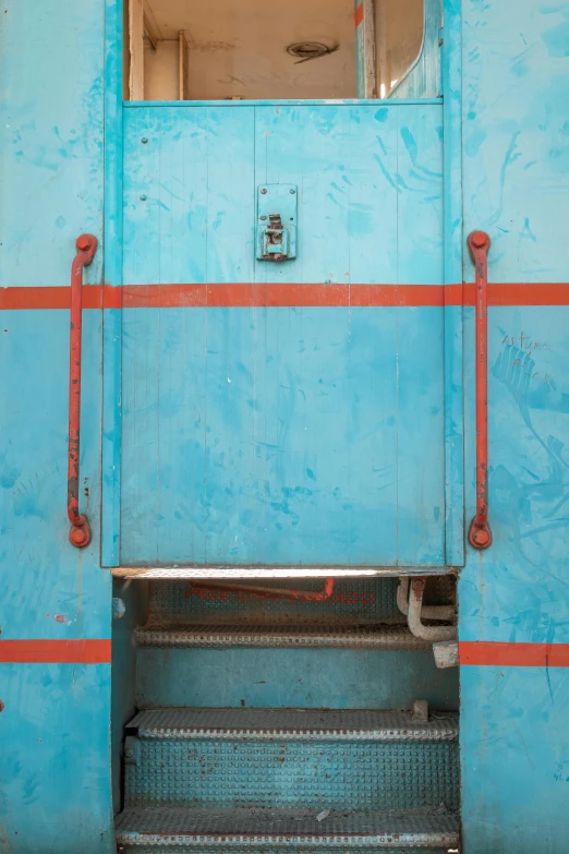 a window with red lines on it and the floor