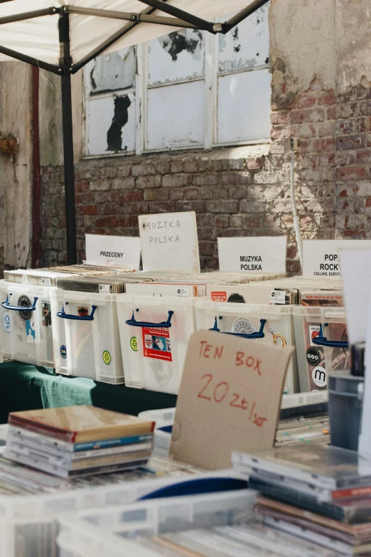 a table with many signs on it under a cover