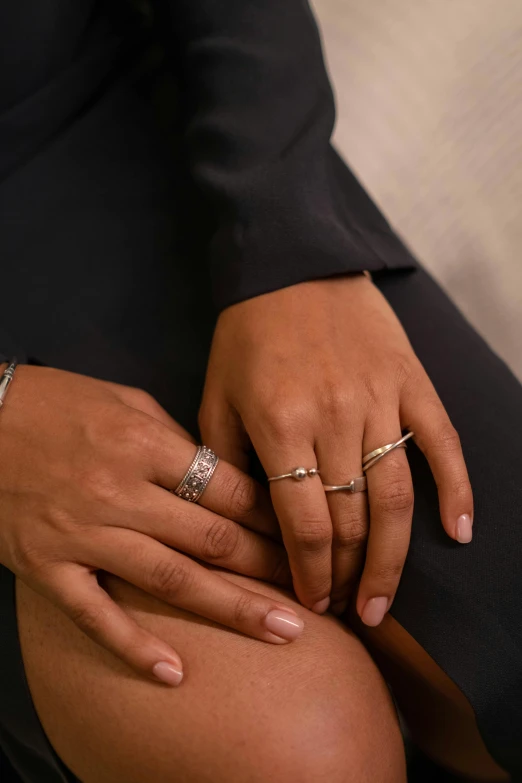 a close - up of a person holding onto a ring with both hands