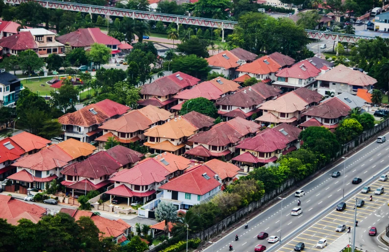 several rows of red roofed houses, near one another