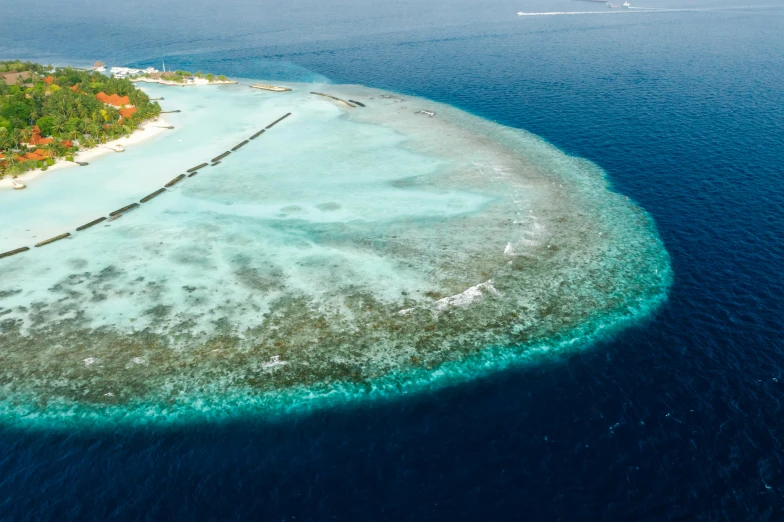 the water around the island is so blue it makes the water look blue