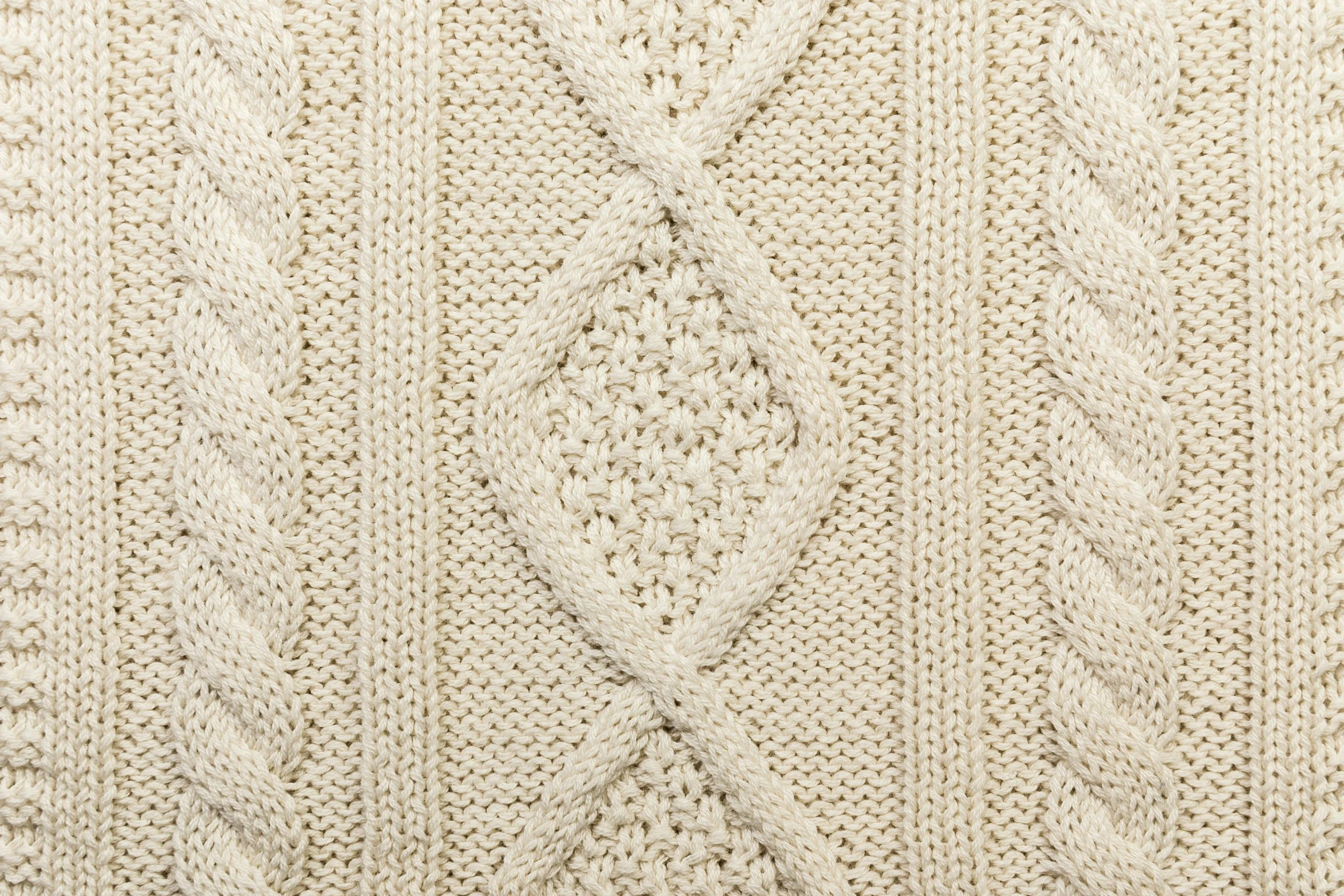 an image of a large white knitted cloth