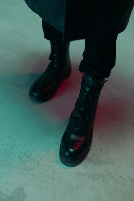 close up of a pair of black shoes on the ground