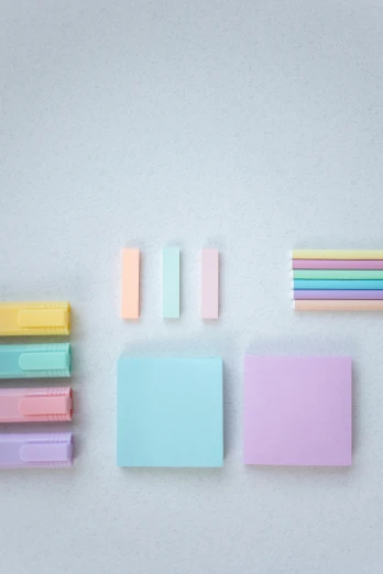 the three post - it notes are sitting on top of each other