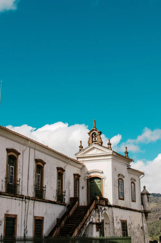 this old building has a clock tower on the top