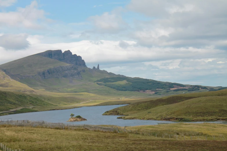 the water is very calm and empty on this mountain side