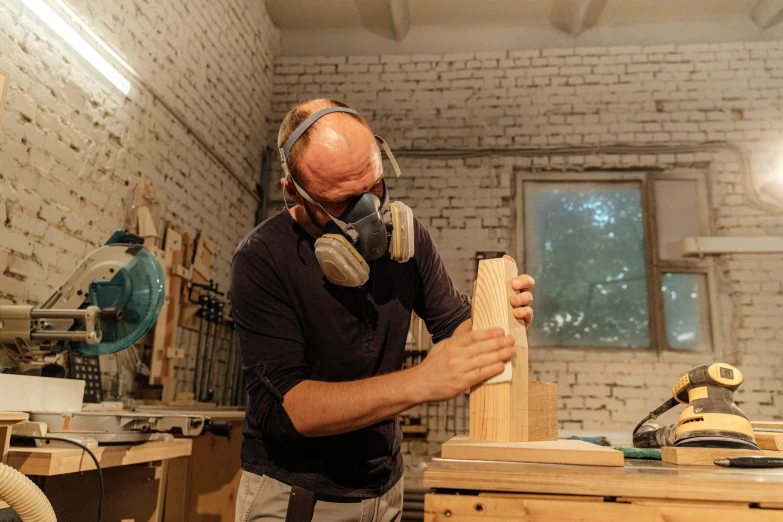 a man that is standing up with a pair of headphones on