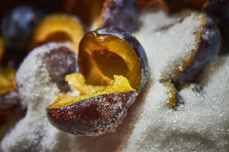 a piece of fruit and powder on the top of it