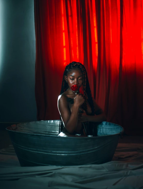 a woman with makeup painted on and in a tub