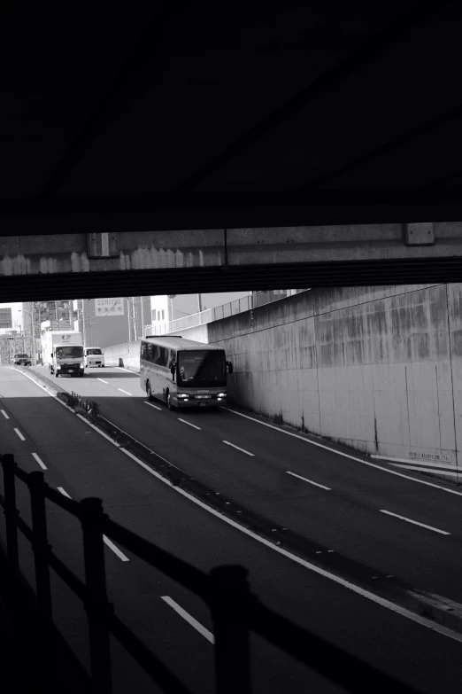 a bus and some cars on the road