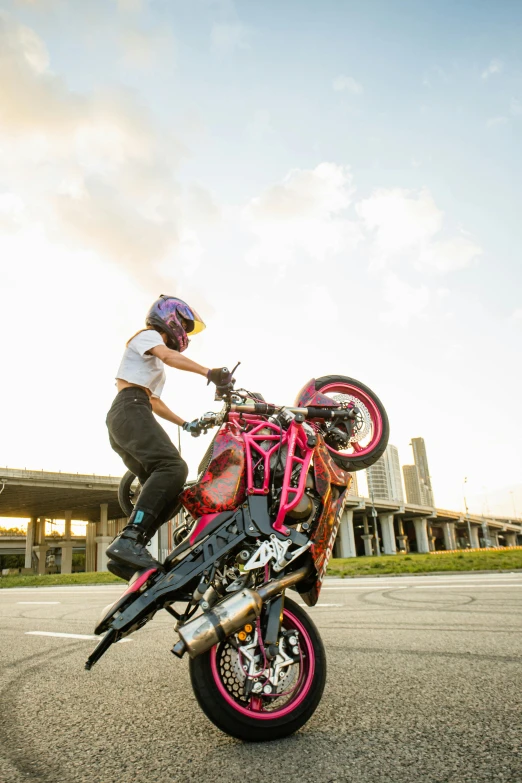 a person riding on the back of a motorcycle