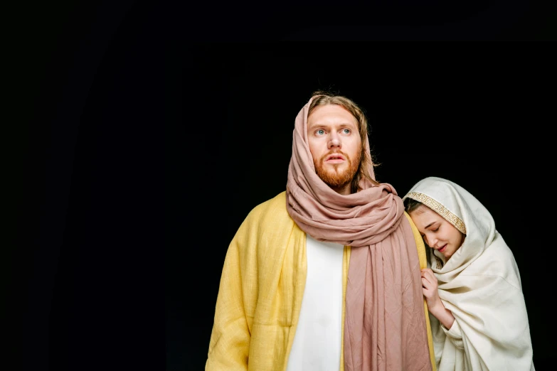 two men dressed as jesus and mary