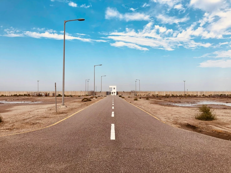 an empty road in the middle of nowhere